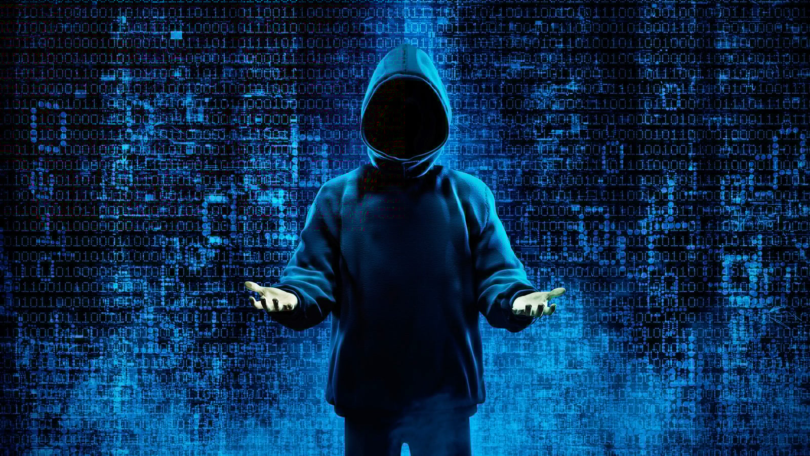 Hacker holding their hands up